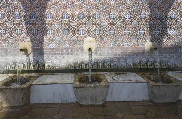 Moorish water fountain in the Andalucian village of Alcaucin, Malaga province, Spain, Europe