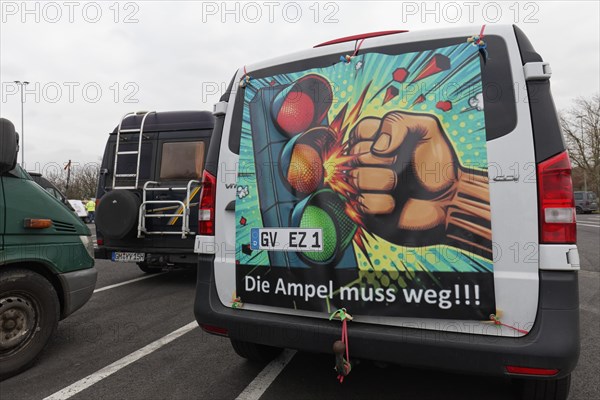 Fist smashes the traffic light, placard on a van, farmers' protests, demonstration against policies of the traffic light government, abolition of agricultural diesel subsidies, Duesseldorf, North Rhine-Westphalia, Germany, Europe