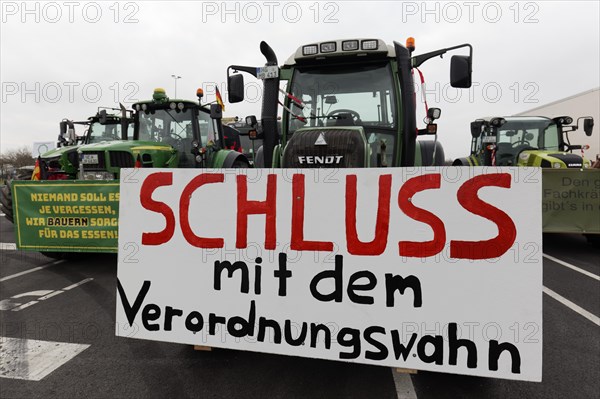 Stop the regulation madness, sign against bureaucracy on a tractor, farmers' protests, demonstration against the policies of the traffic light government, abolition of agricultural diesel subsidies, Duesseldorf, North Rhine-Westphalia, Germany, Europe