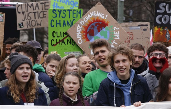 Climate activists Luisa Marie Neubauer (left) and Greta Thunberg demonstrate with thousands of students in Berlin during a Friday for Future demo for the fight against global warming, 29 March 2019