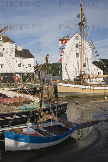 Historic boats on the River Deben by the historic Tide Mill, Woodbridge, Suffolk, England, United Kingdom, Europe
