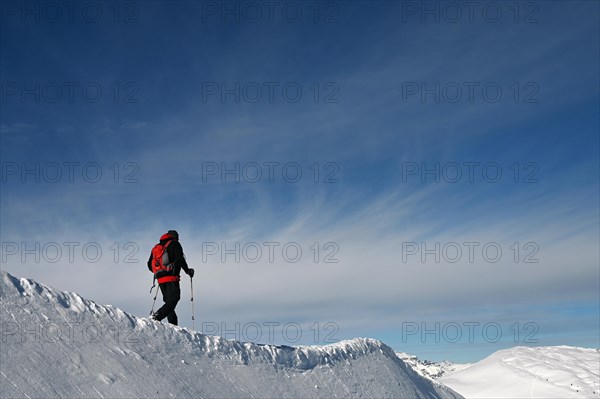 Snowshoe hiking in the Beverin nature park Park, Graubuenden, Switzerland, Europe