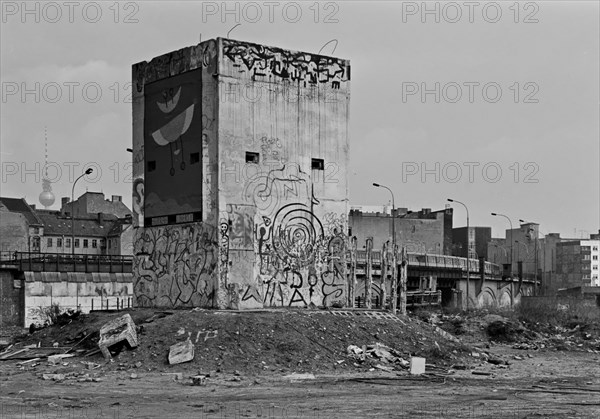 Former GDR watchtower after the fall of the Wall between the city railway and the Spree, Mitte district, Berlin, Germany, Europe