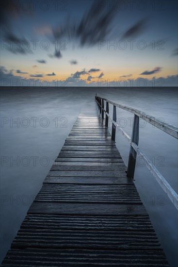 Long exposure of a jetty at the North Sea at high tide, high photograph, sunset, landscape photography, Lower Saxony Wadden Sea, Cuxhaven, Lower Saxony, Germany, Europe