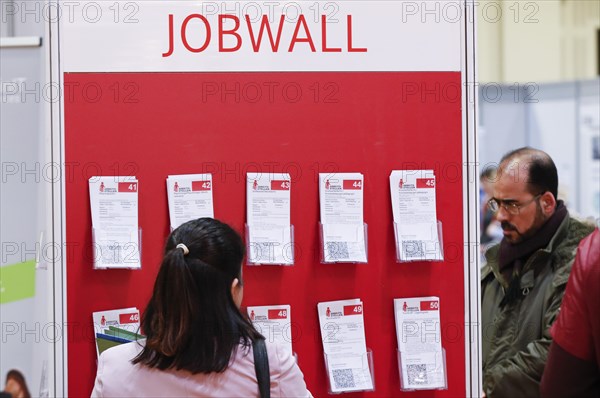 Job offers are posted on a job wall at the job exchange for refugees and foreign citizens in Berlin, 28/01/2018