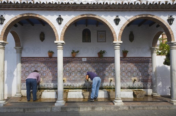 Moorish water fountain in the Andalucian village of Alcaucin, Malaga province, Spain, Europe