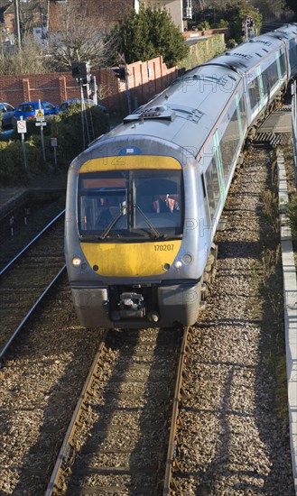 Class 170 turbostar diesel train on rail tracks, Woodbridge, Suffolk, England, United Kingdom, Europe