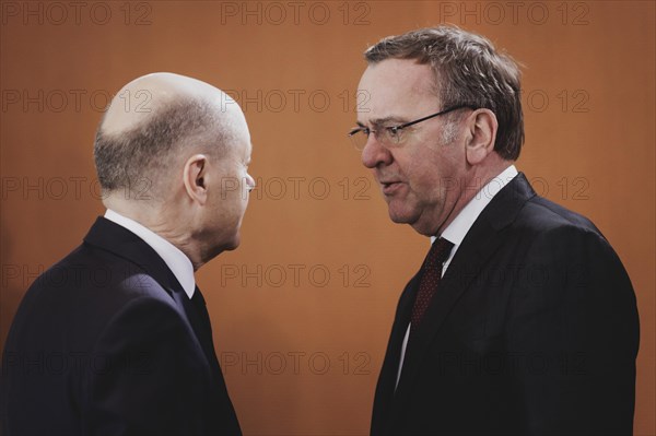 (L-R) Olaf Scholz (SPD), Federal Chancellor, and Boris Pistorius (SPD), Federal Minister of Defence, pictured during the weekly cabinet meeting in Berlin, 21.02.2024