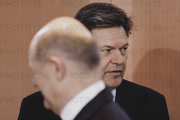 (R-L) Robert Habeck (Alliance 90/The Greens), Federal Minister for Economic Affairs and Climate Protection and Vice-Chancellor, and Olaf Scholz (SPD), Federal Chancellor, at the weekly cabinet meeting in Berlin, 21 February 2024