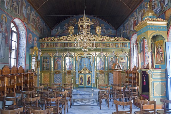 Interior of a church with iconostasis and wooden chairs, Monastery of St Nicholas, Monastery of Agios Nikolaos, Agiou Nikolaou, Vistonidas Burma Lagoon, Porto Lagos, Xanthi, Eastern Macedonia and Thrace, Greece, Europe