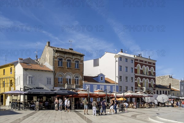 Cafe and restaurant in the old town centre of Porec, Istria, Croatia, Europe