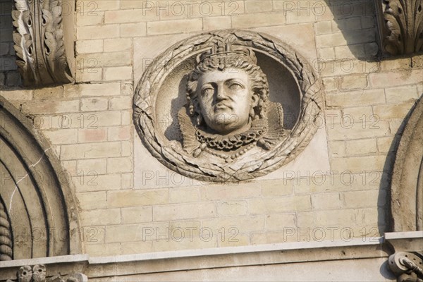 Queen Elizabeth 1 Royal roundel portraits on Great Eastern hotel building Harwich, Essex, England, United Kingdom, Europe