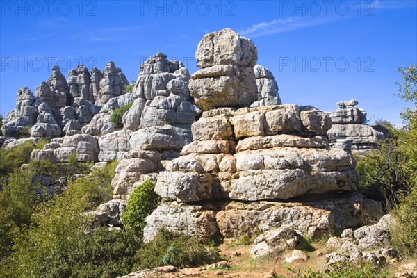 Dramatic limestone scenery of rocks shaped by erosion and weathering at El Torcal de Antequera national park, Andalusia, Spain, Europe