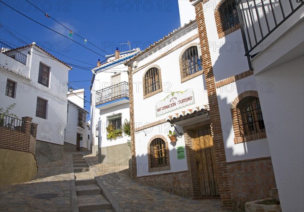 Tourist information building and alleyways in the Andalusian village of Comares, Malaga province, Spain, Europe