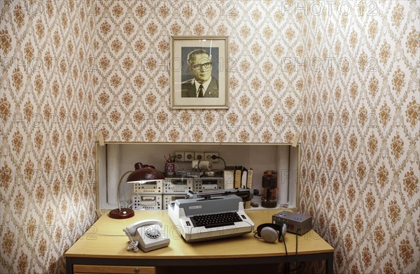 Stasi study with picture of Erich Honecker in the DDR Museum. The DDR Museum shows the life and everyday culture of the GDR in a permanent exhibition, 11.06.2019