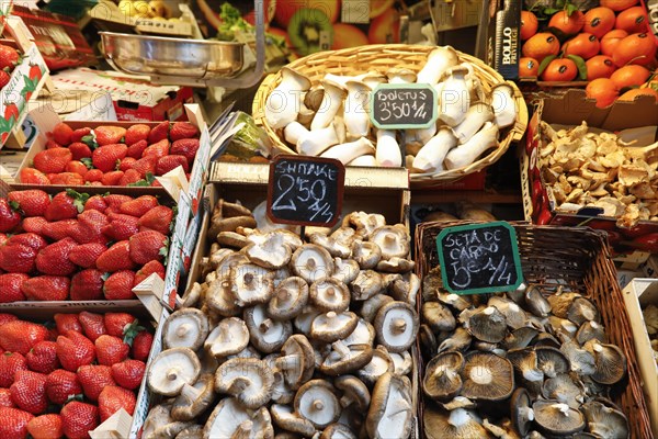 Fresh Spanish fruit and mushrooms at the vegetable market in Malaga, 12/02/2019