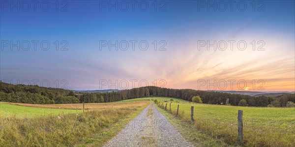 A path with a view of the Weserbergland, landscape, nature photograph, sunset, evening mood, Goldbeck, Rinteln, Lower Saxony, Germany, Europe