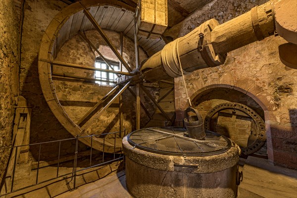 Fountain with pedal wheel, wheel fountain, draw well, well house, knight's castle from the Middle Ages, Ronneburg Castle, Ronneburg hill country, Main-Kinzig district, Hesse, Germany, Europe