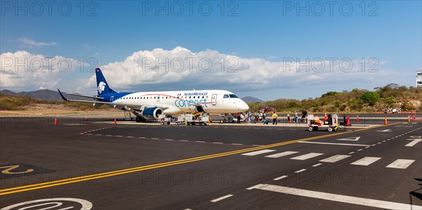 AeroMexico Embraer EJS-190 aircraft at the airport of Huatulco, Baja de Huatulco, South Pacific Coast, State of Oaxaca, Mexico, Central America