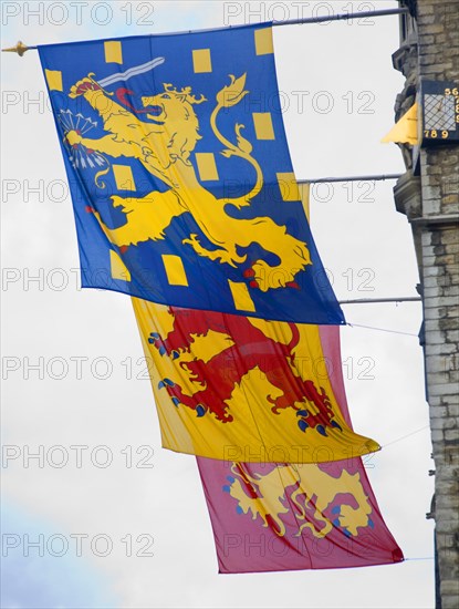 Flags flying against the sky, Gouda, Netherlands