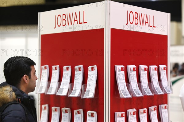 Job offers are posted on a job wall at the job exchange for refugees and foreign citizens in Berlin, 28/01/2018