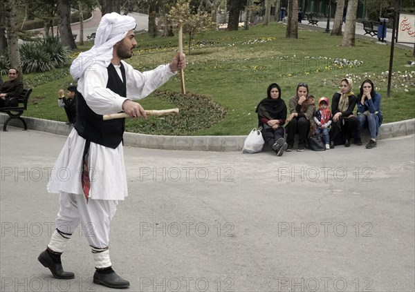 Musicians in traditional dress play music in a park in Tehran, Iran, woman, 14.03.2019, Asia