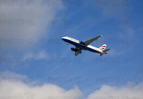 British Airways Airbus A320-232 aeroplane taking off from Gatwick airport, London, UK
