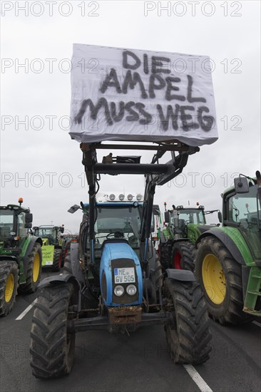 Tractor with sign, The traffic lights must go, Farmer protests, Demonstration against policies of the traffic light government, Abolition of agricultural diesel subsidies, Duesseldorf, North Rhine-Westphalia, Germany, Europe