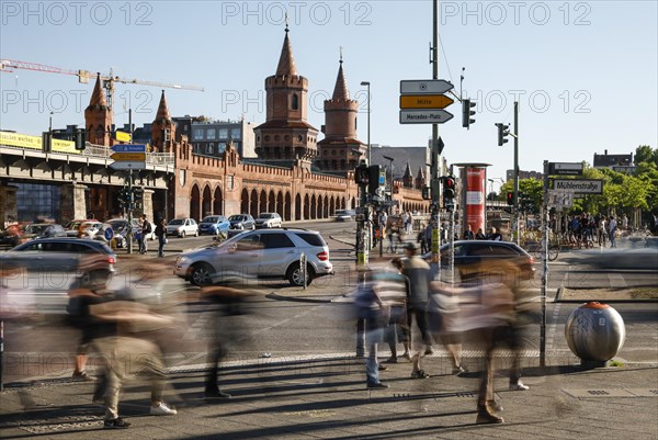 Long exposure shows pedestrians at the Oberbaum Bridge intersection, Berlin, 05/05/2018