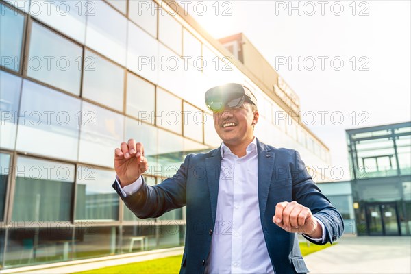 Businessman using virtual reality headset outside a financial building