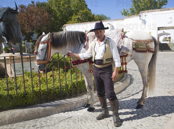 Horseman and his horse in traditional riding clothes near the bullring in Ronda, Spain, Europe