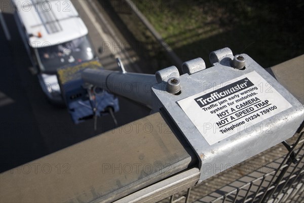 Trafficmaster traffic system camera monitoring vehicle flow from a bridge, UK