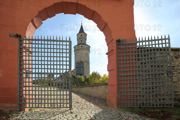 View through archway and metal lattice to witch tower from castle, through, landmark, Idstein, Taunus, Hesse, Germany, Europe