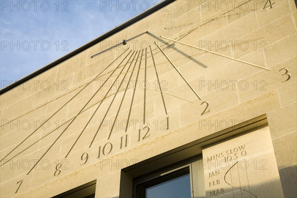 Modern sun dial clock Foundress Court sundial in Pembroke College, University of Cambridge, England, United Kingdom, Europe
