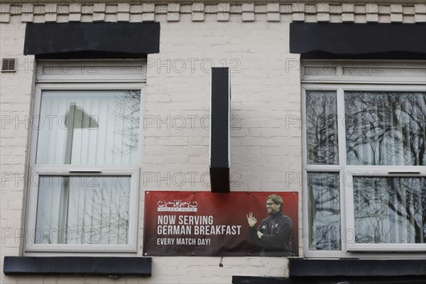 A hotel in the immediate vicinity of Liverpool FC's football stadium advertises with a picture of Juergen Klopp and the phrase Now serving German Breakfast, 02.03.2019