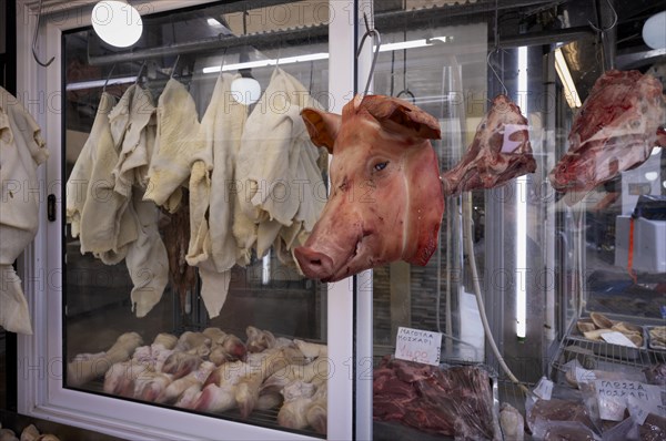 Display of fresh meat, butcher's shop, pig's head, food, Kapani market, Vlali, Thessaloniki, Macedonia, Greece, Europe