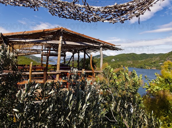 Ledi's Place, restaurant, hostel and camp, overlooking the Koman reservoir in the wilderness of the Albanian Alps in northern Albania. Koman, Qark Shkodra, Albania, South-East Europe, Europe