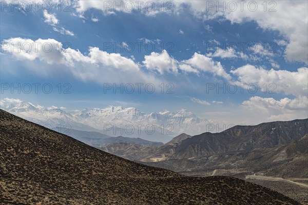 Desert landscape before the Annapurna mountain range, Kingdom of Mustang, Nepal, Asia