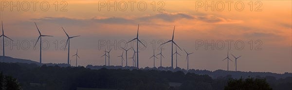 Wind turbines in the sunset, Schoenberg, Mecklenburg-Vorpommern, Germany, Europe