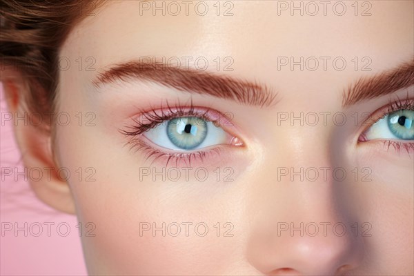 Close up of woman's light blue eyes with pink eyeshadow makeup. KI generiert, generiert AI generated