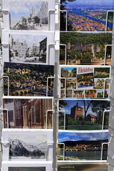 Postcard stand with various postcards of Heidelberg, Heidelberg, Baden-Wuerttemberg, Germany, Europe