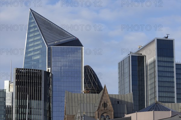 The Gherkin skyscraper building and nearby high rise office buildings, City of London, England, United Kingdom, Europe