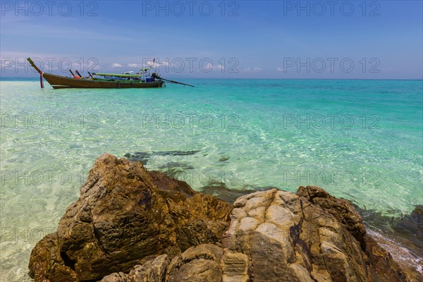 Fishing boat, wooden boat, bathing beach, swimming, bathing, bay, bay, sea, ocean, Andaman Sea, tropical, island, rock, rock, water, beach, beach holiday, Caribbean, environment, clear, clean, peaceful, picturesque, stone, sea level, climate, travel, tourism, natural landscape, paradisiacal, beach holiday, sun, sunny, holiday, dream trip, holiday paradise, paradise, coastal landscape, nature, idyllic, turquoise, Siam, exotic, travel photo, beach landscape, sandy beach, Phi Phi Island, Thailand, Asia