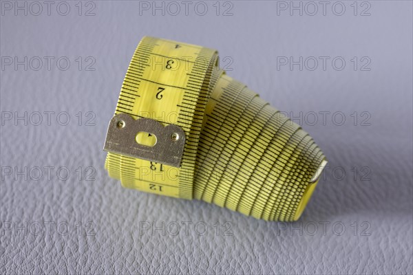 Yellow tape measure, roll