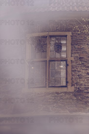 Gatehouse, moated castle, historical, formerly Bruenninghausen Castle, Rombergpark Dortmund, City of Dortmund, detail of a window, partly blurred, Dortmund, Germany, Europe