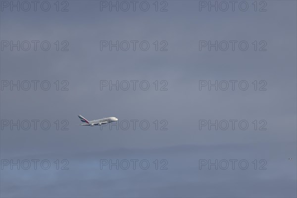 Airbus A380 aircraft of Emirates airlines in flight, England, United Kingdom, Europe