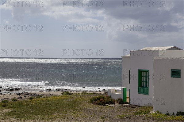 Small house on the beach of Playa Honda, Lanzarote, Canary Islands, Spain, Europe