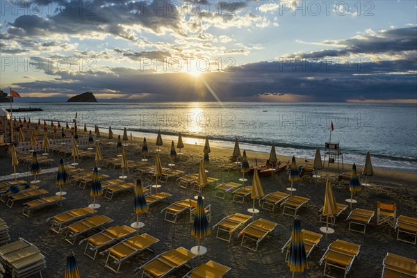 Empty beach and beach loungers, sunrise, Spotorno, Riviera di Ponente, Liguria, Italy, Europe