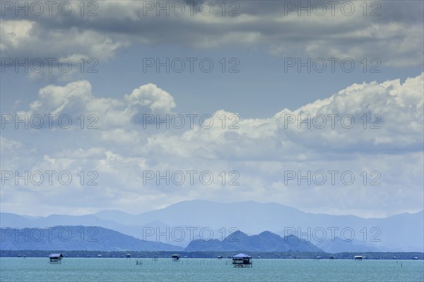 Island world near Surat Thani during ferry trip to Koh Samui, cloud, sky, blue sky, water, sea, boat trip, asian, summer, ocean, holiday, travel, tourism, far, wide, panorama, boat trip, sea trip, ferry, exotic, landscape, seascape, natural landscape, calm, longing, blue, green, weather, cloudy, island, Thailand, Asia