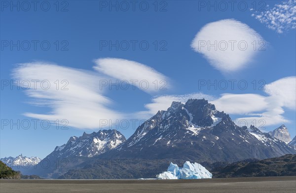 Iceberg and cloud formation, Lago Grey, Torres del Paine National Park, Parque Nacional Torres del Paine, Cordillera del Paine, Towers of the Blue Sky, Region de Magallanes y de la Antartica Chilena, Ultima Esperanza Province, UNESCO Biosphere Reserve, Patagonia, End of the World, Chile, South America